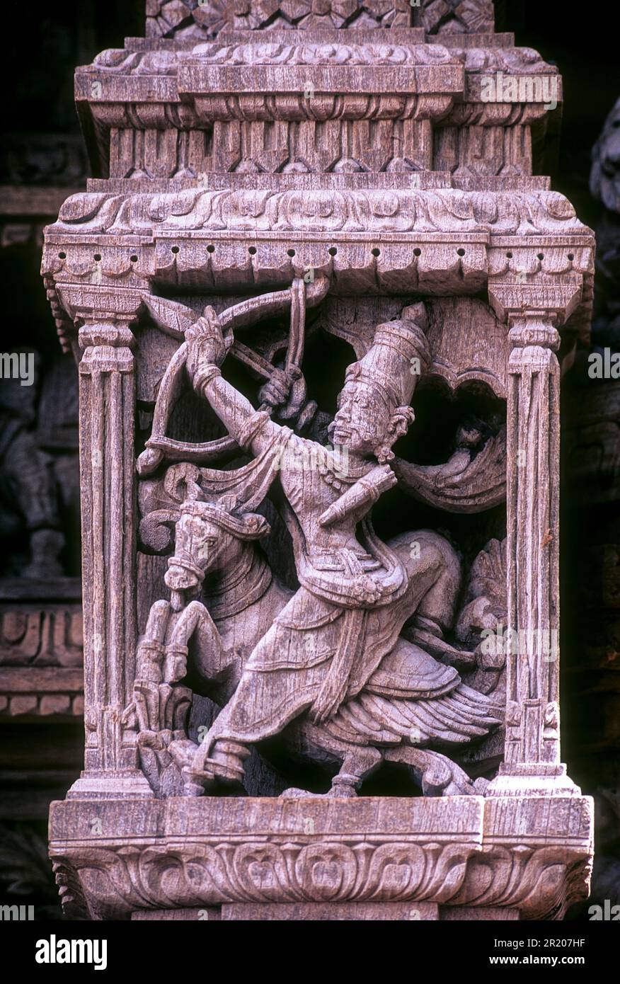 Revanta as a huntsman on a horse, with a bow and arrow, 17th century wooden carvings in Meenakshi-Sundareswarar temple Chariot at Madurai, Tamil Stock Photo