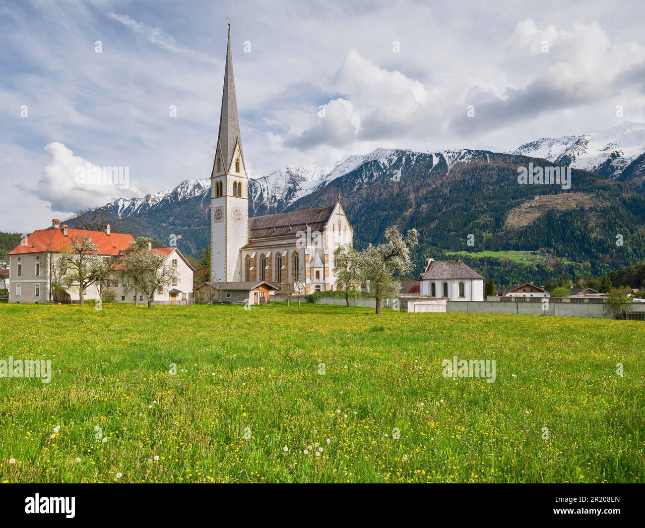 Parish church Untermieming in spring, Mieming, Mieminger Plateau, mountains with snow, Tyrol, Austria Stock Photo