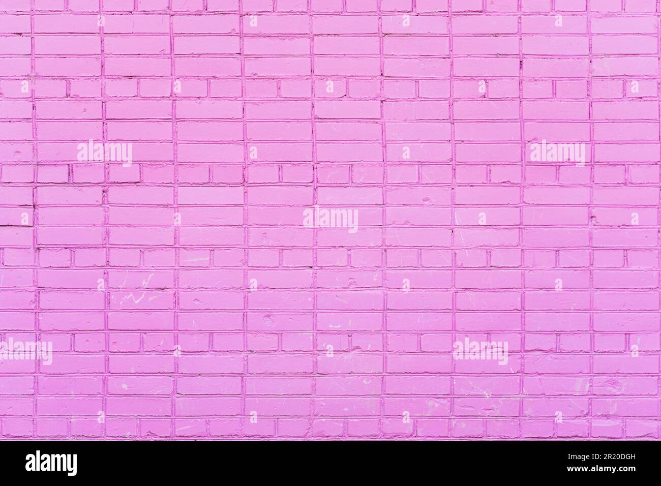 Old purple pink violet color paint brick wall texture, abstract background, copy space Stock Photo