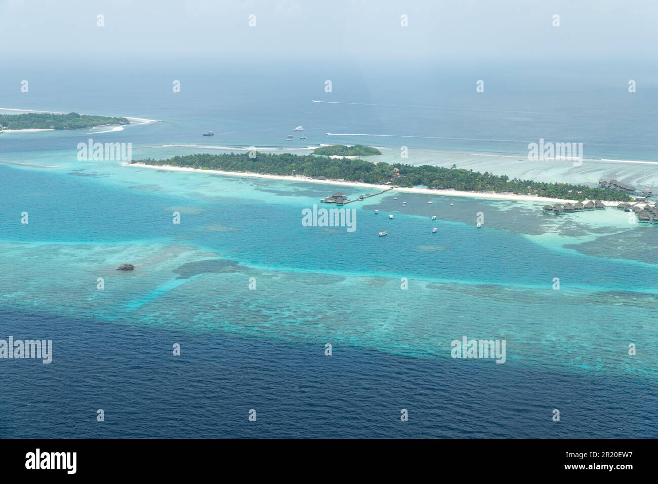 aerial landscape view of the tropical paradise of Maldives. pristine white sand beaches with turquoise blue waters of a tropical beach. exotic beach h Stock Photo