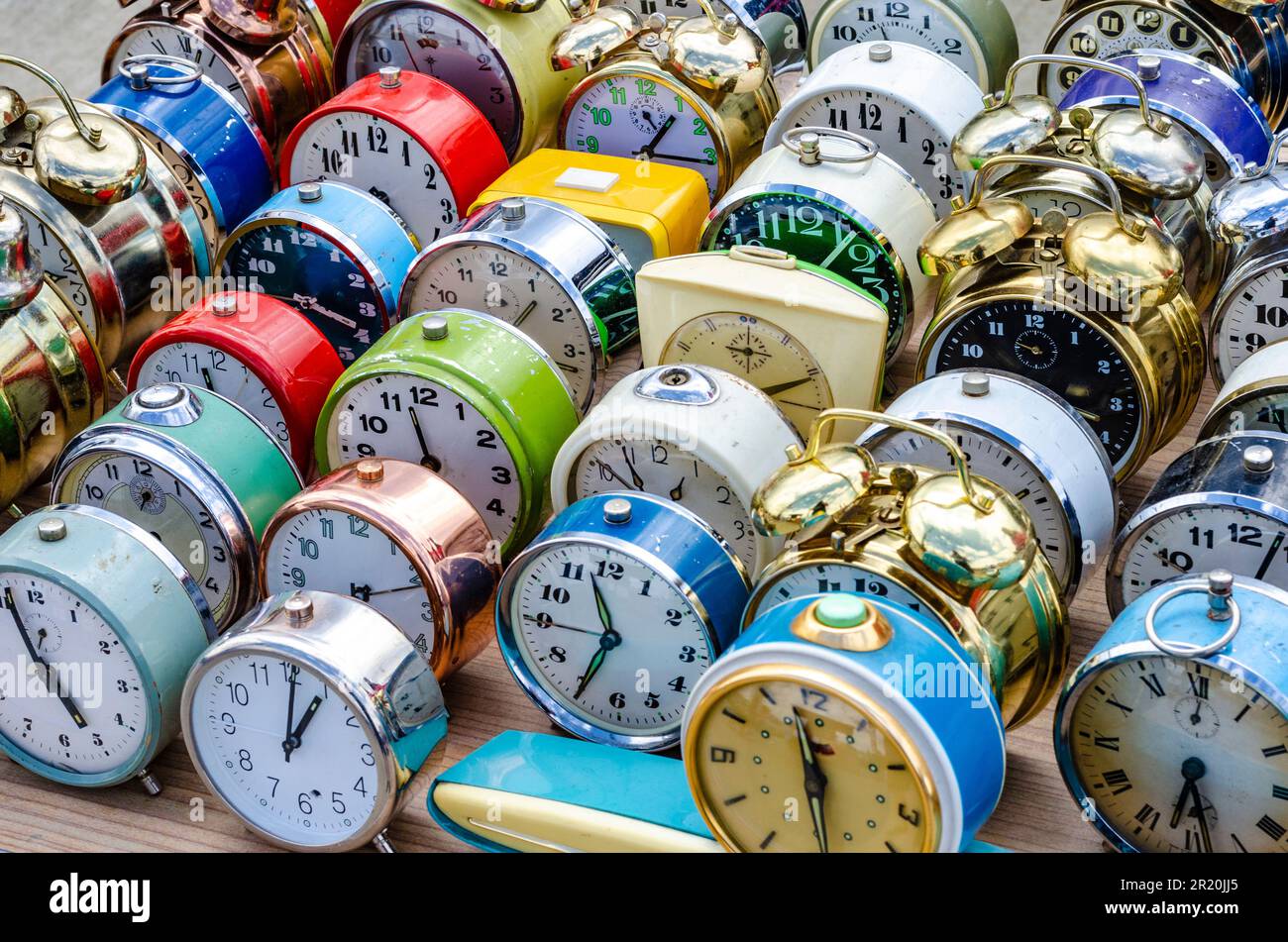 Many old vintage alarm clocks on the flea market Stock Photo Alamy