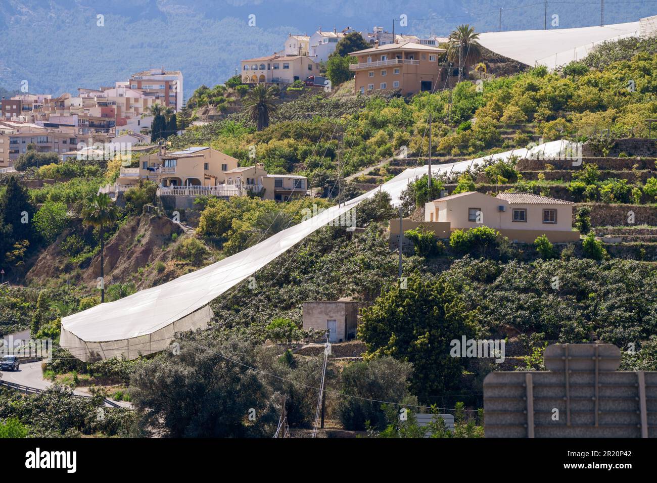 Mountains with cultivated ‘vineyards’ farmland and greenhouse agriculture in Spain Stock Photo