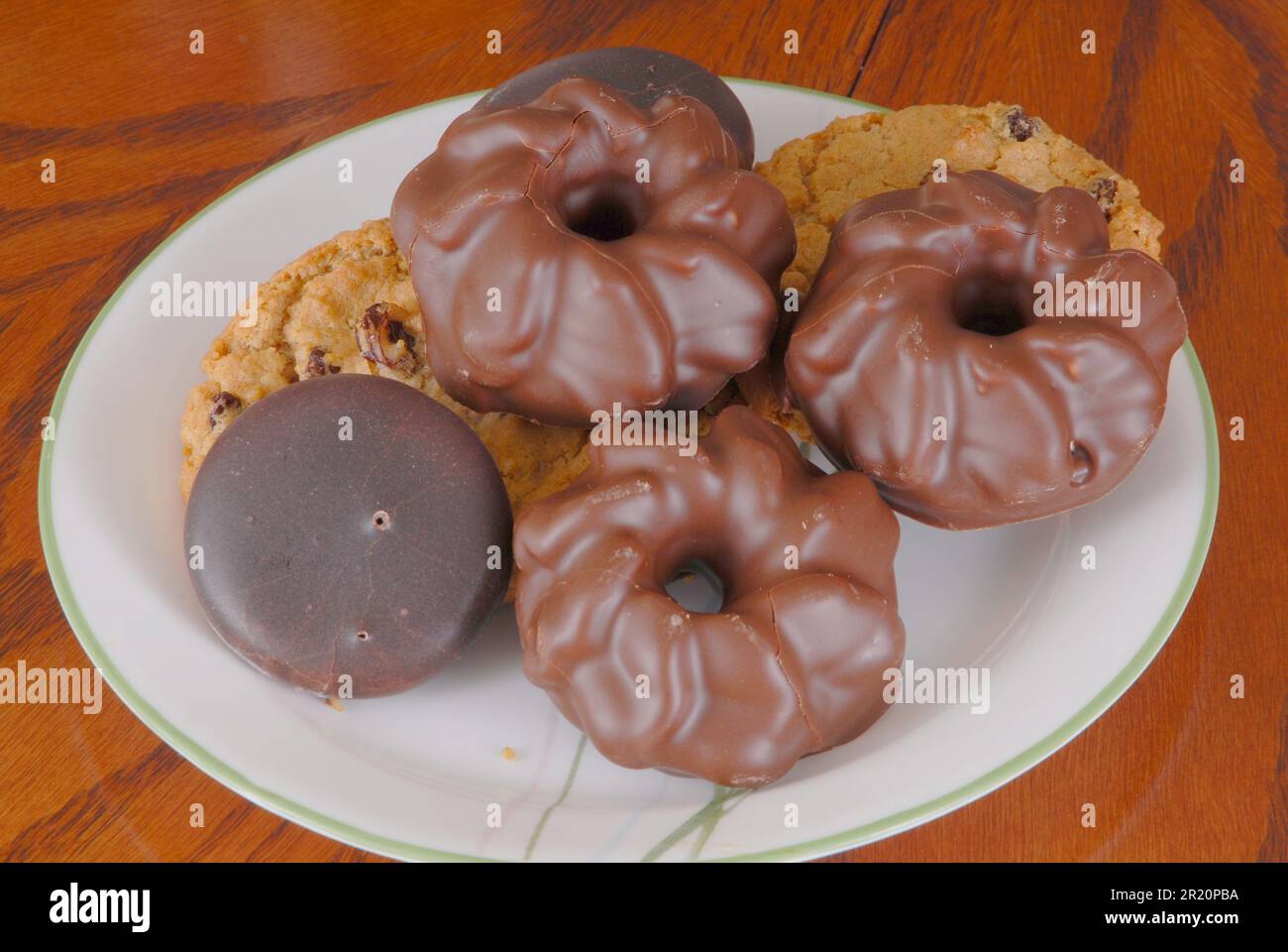 Plate of horribly fattening chocolate and raisin cookies Stock Photo