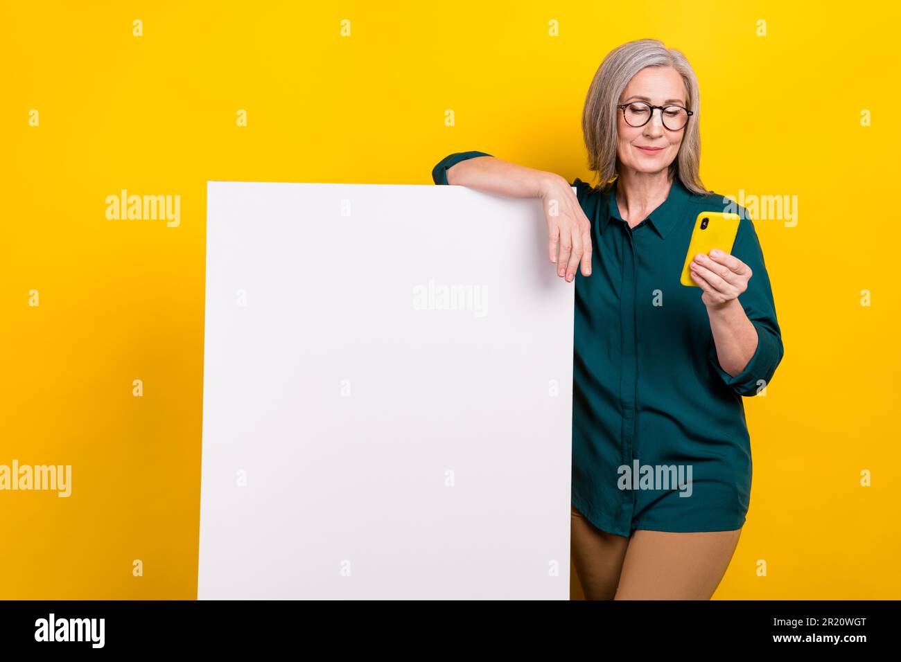 Promoted Lady Photo of promoter aged lady search cell gadget enjoying promotion empty ...
