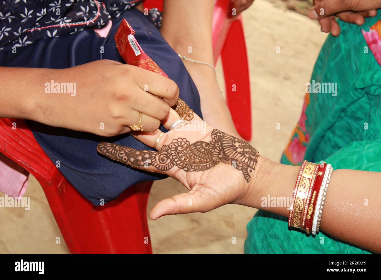 Henna Tattoo Mehndi on hand bridal mehndi Design Background close up Stock Photo