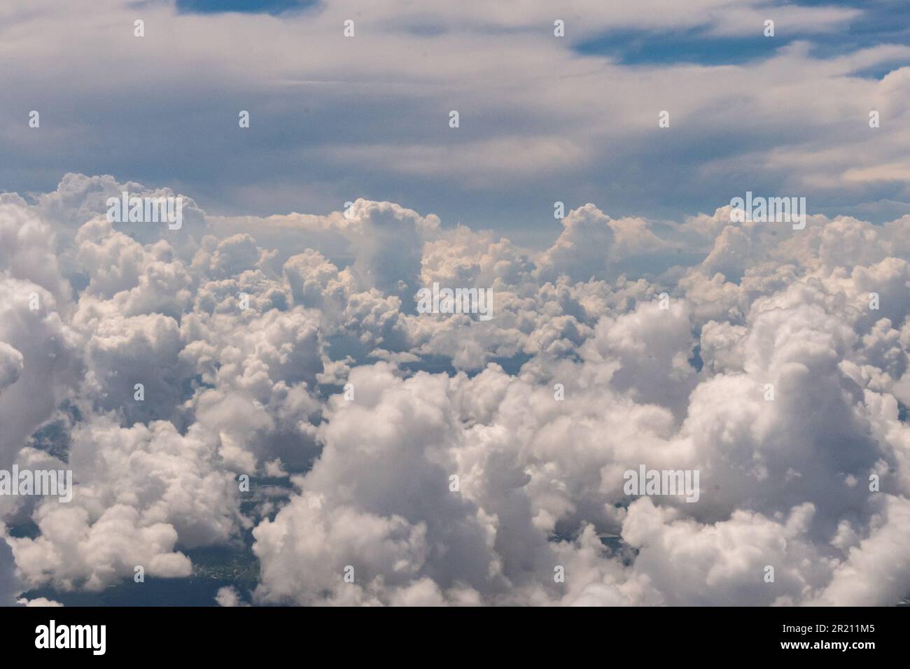 Aerial view of Clouds outside of an airplane window on a trip from Houston to Los Angeles Stock Photo