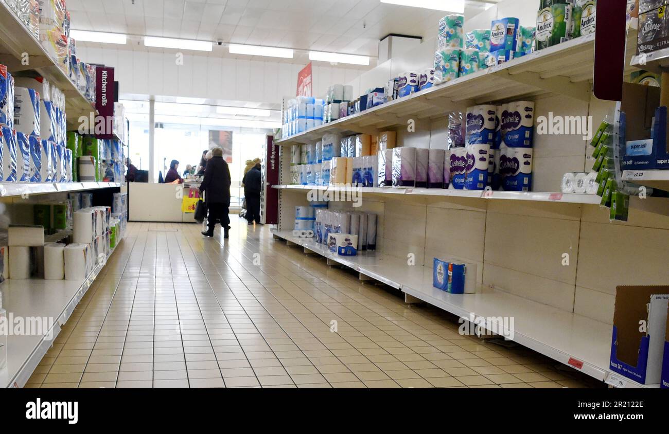 Photograph of empty shelves at a Sainsburys' supermarket, a result of