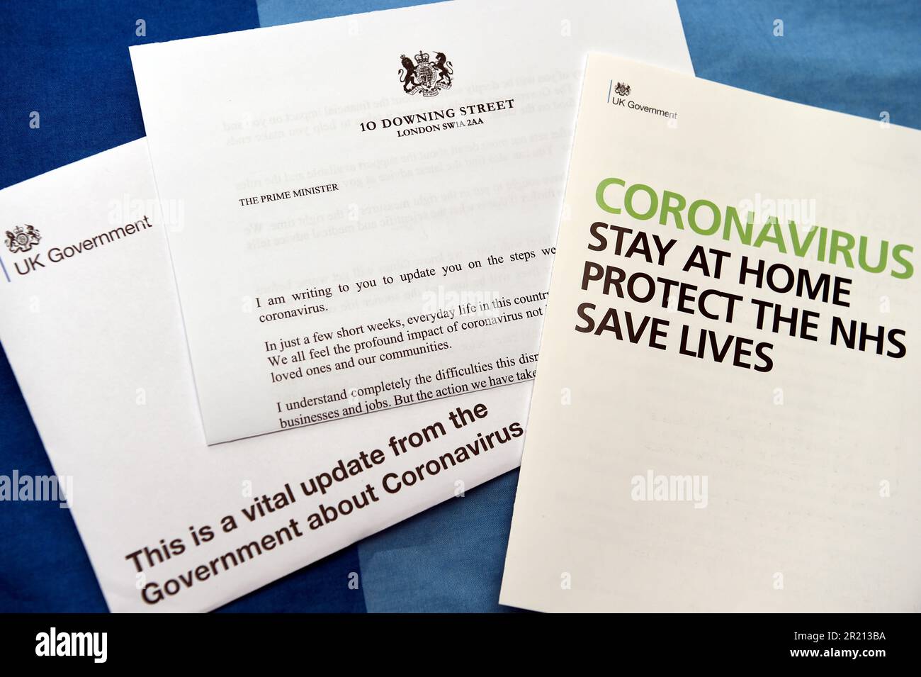 Photograph showing the letter sent out by the UK government and the Prime Minister Boris Johnson to every UK household during the COVID-19 pandemic. The letter urged people to stay at home, protect the NHS, and to save lives. Stock Photo