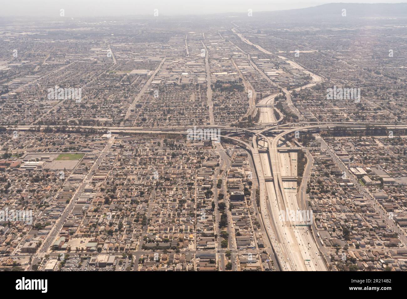 Los Angeles California - Aerial picture of The Interchange at the intersection of the I-105 and the I--110 (harbor freeway) & the Metro Green Line Stock Photo