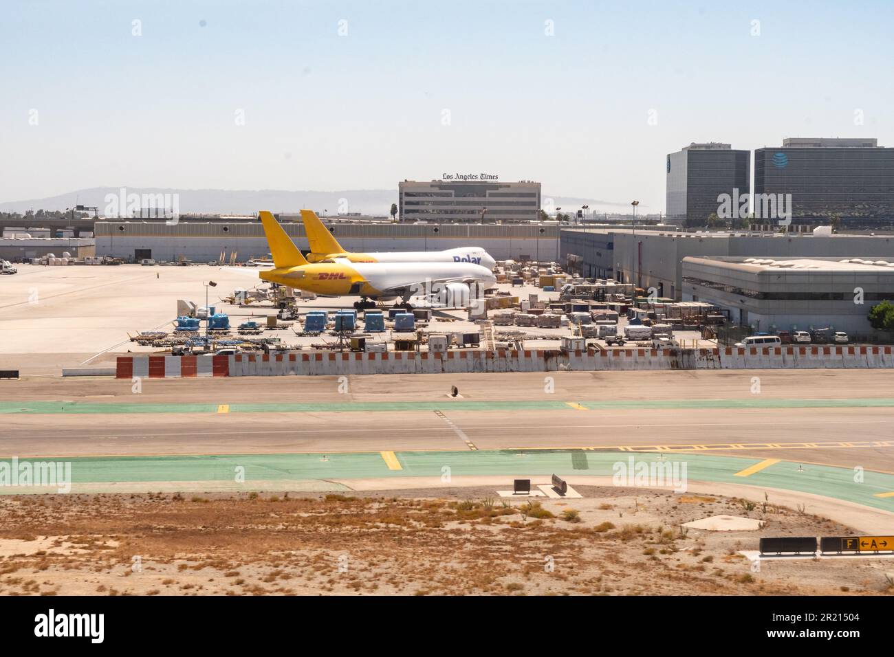DHL and Polar Cargo planes by the shipping terminal at LAX - Los Angeles California Stock Photo