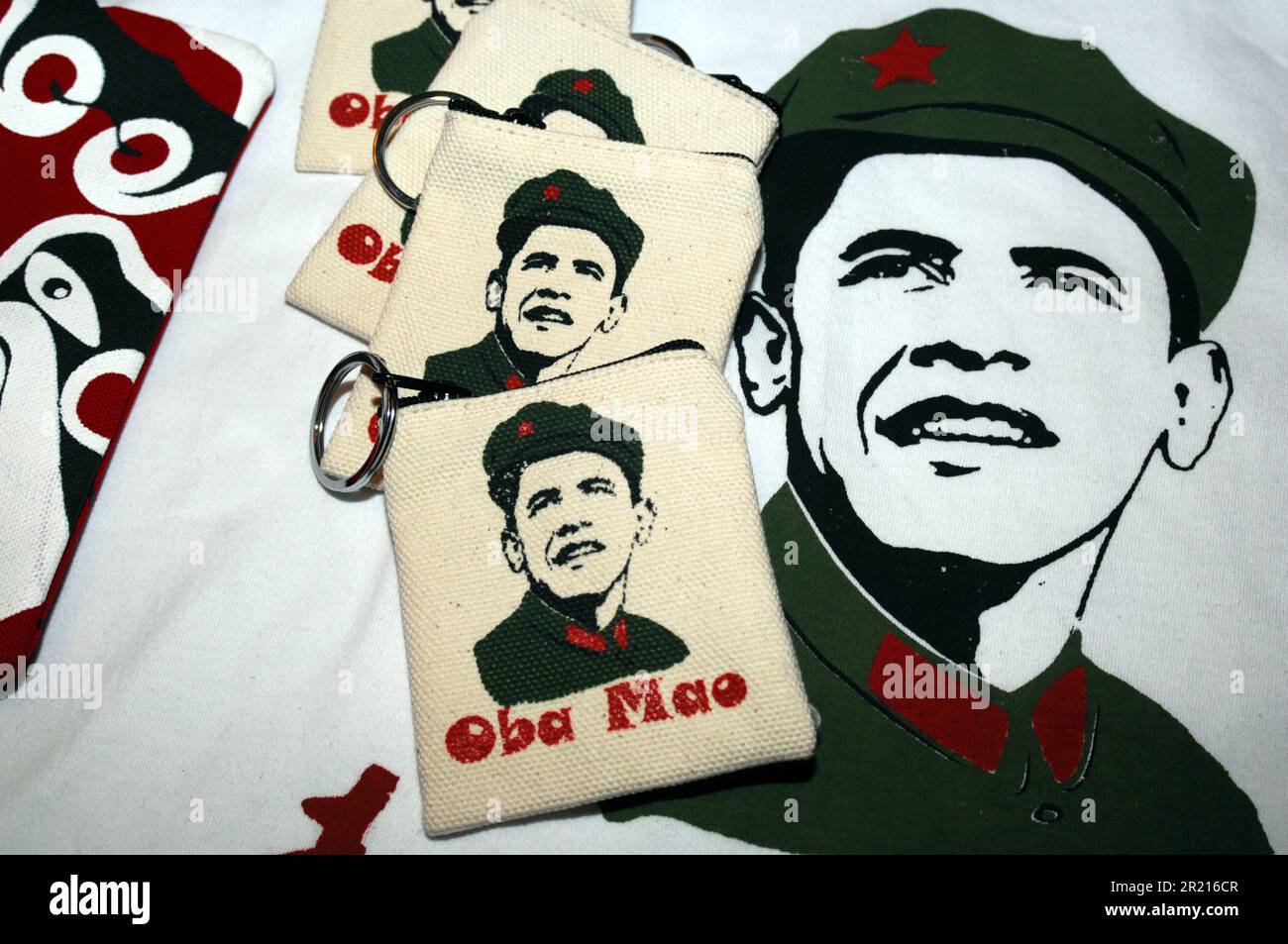 Beijing, China - Obamao t-shirts and coin purses on sale at a shop in Beijing. They were designed by Liu Mingjie, who goes by the adopted English name Stefan. Depicting US President Obama in Red guard uniform with the slogan 'Serve the People Stock Photo