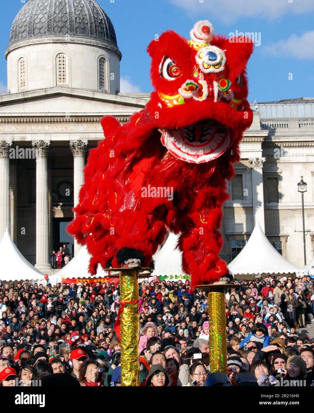 Chinese New Year Celebrations in London. Year of the Ox. Chinese New Year Celebrations in London - Acrobatic performances of a Chinese lion Stock Photo