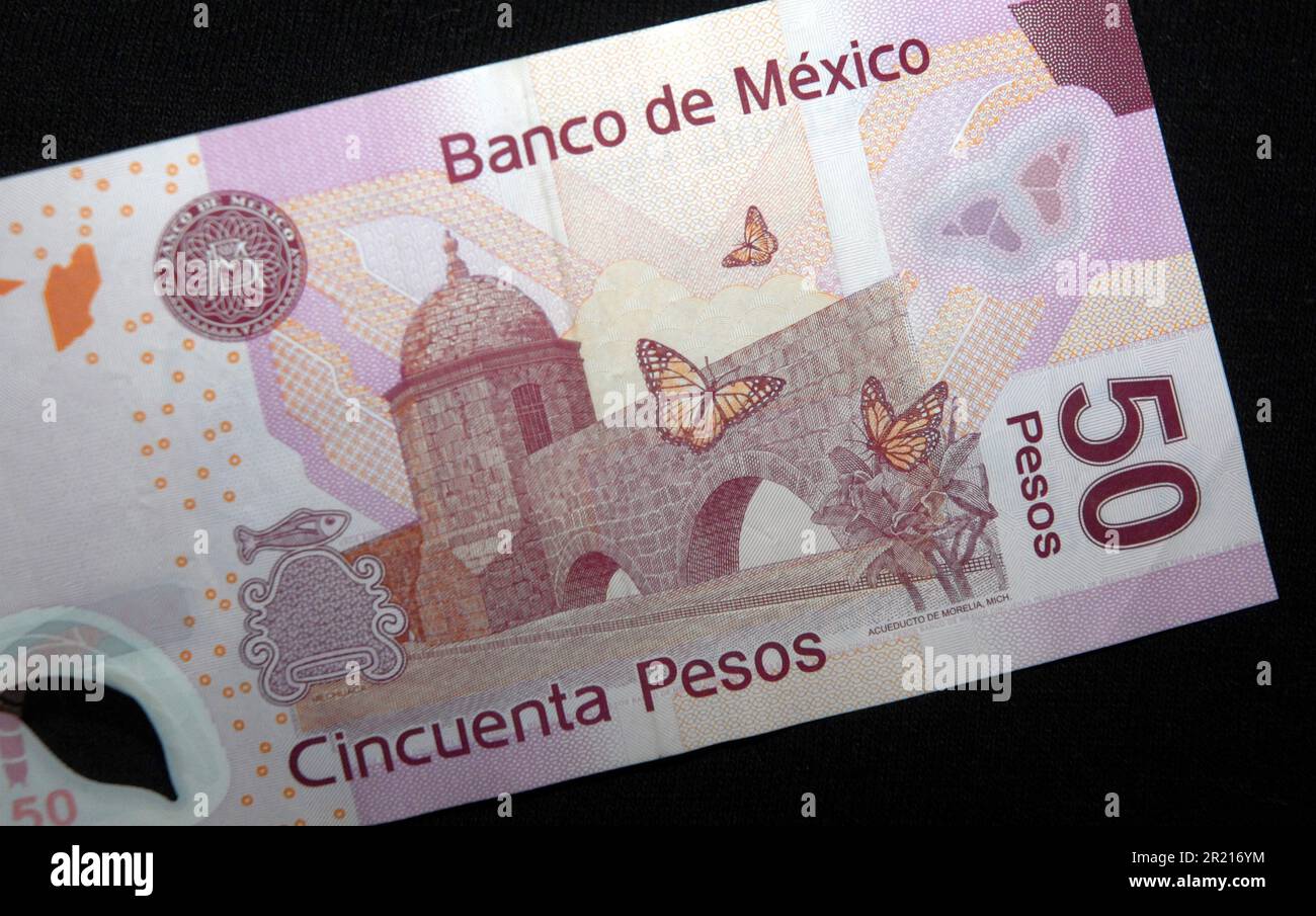 A mexican 50 peso banknote the mexican peso was the first currency in
