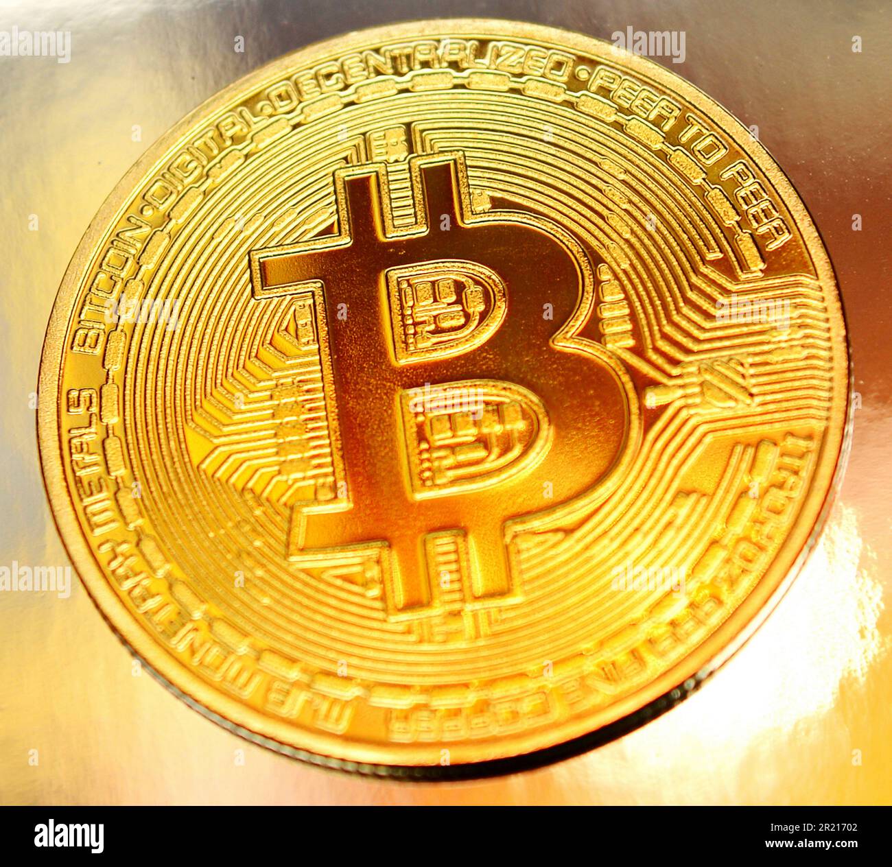 Bitcoin, a decentralized digital currency, without a central bank or single  administrator, that can be sent from user to user on the peer-to-peer  bitcoin network without the need for intermediaries Stock Photo -