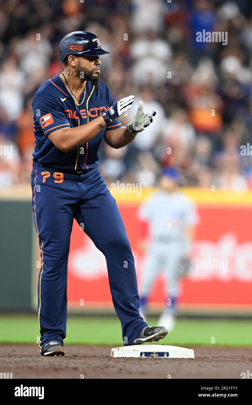 Houston Astros first baseman Jose Abreu (79) celebrates hitting a 2 RBI double to center field in the bottom of the first inning during the MLB game b Stock Photo