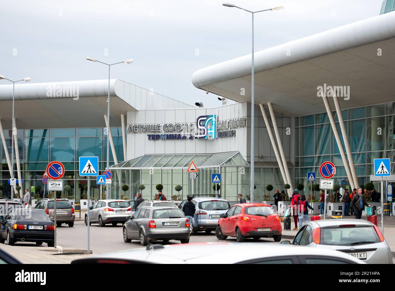 Outside Sofia Airport exterior and car traffic in Sofia, Bulgaria, Eastern Europe, Balkans, EU Stock Photo