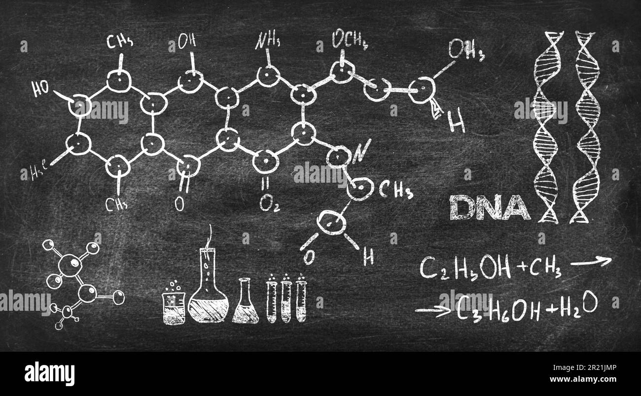 drawing chemical formula on black chalk board Stock Photo
