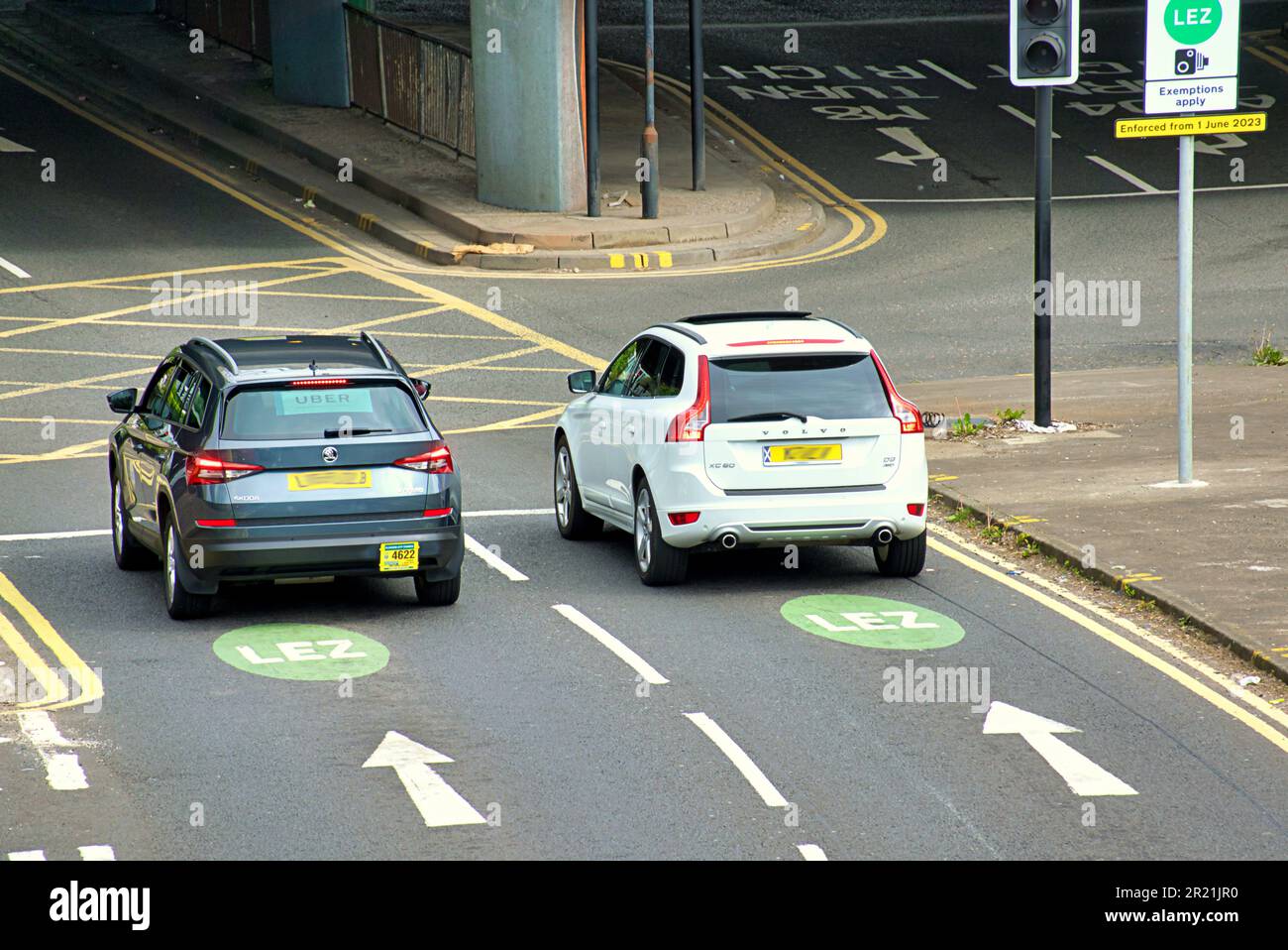 Glasgow, Scotland, UK 16th May, 2023. LEZ Low emission zones preparation sees road signs and painted road directions complete with roadside advert to prepare for the fine start date of the 1st of June in cities all over Scotland. Credit Gerard Ferry/Alamy Live News Stock Photo