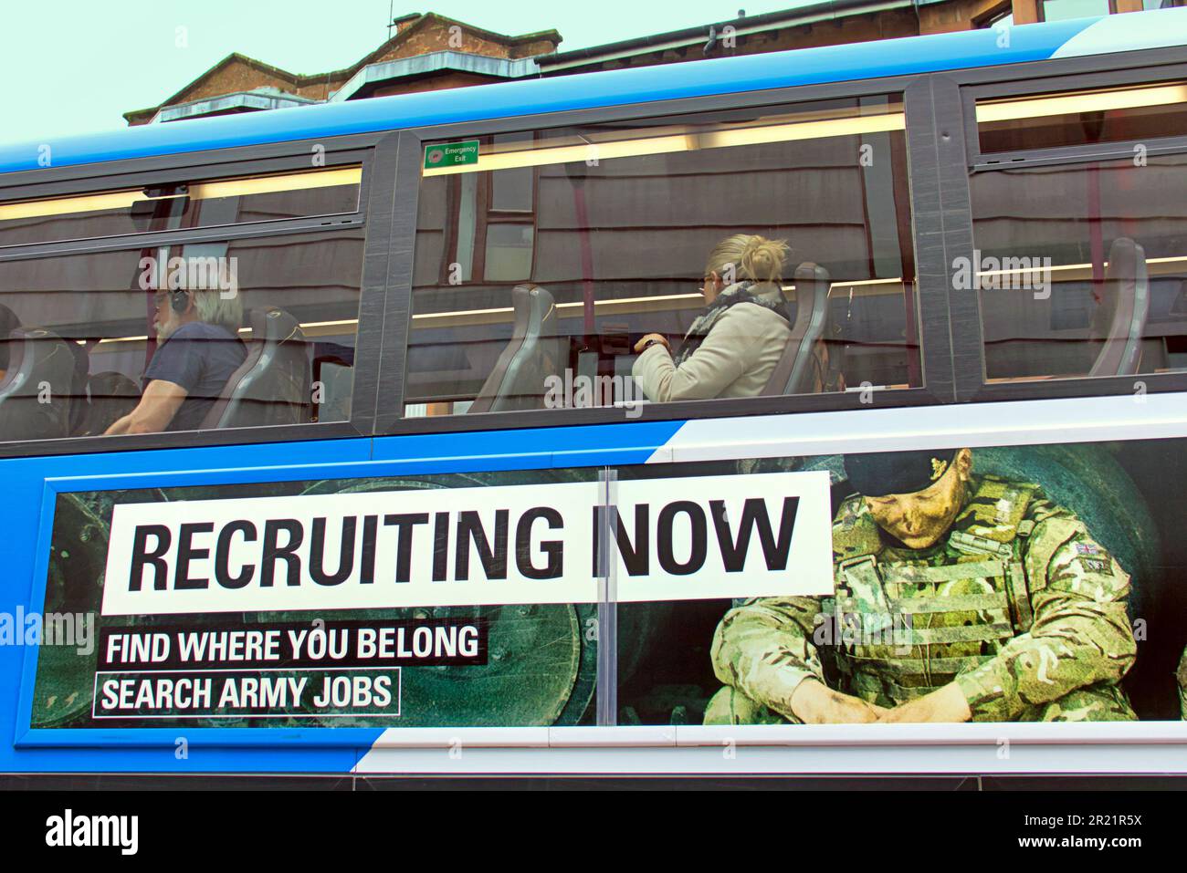 army recruitment poster on the side of a bus Stock Photo