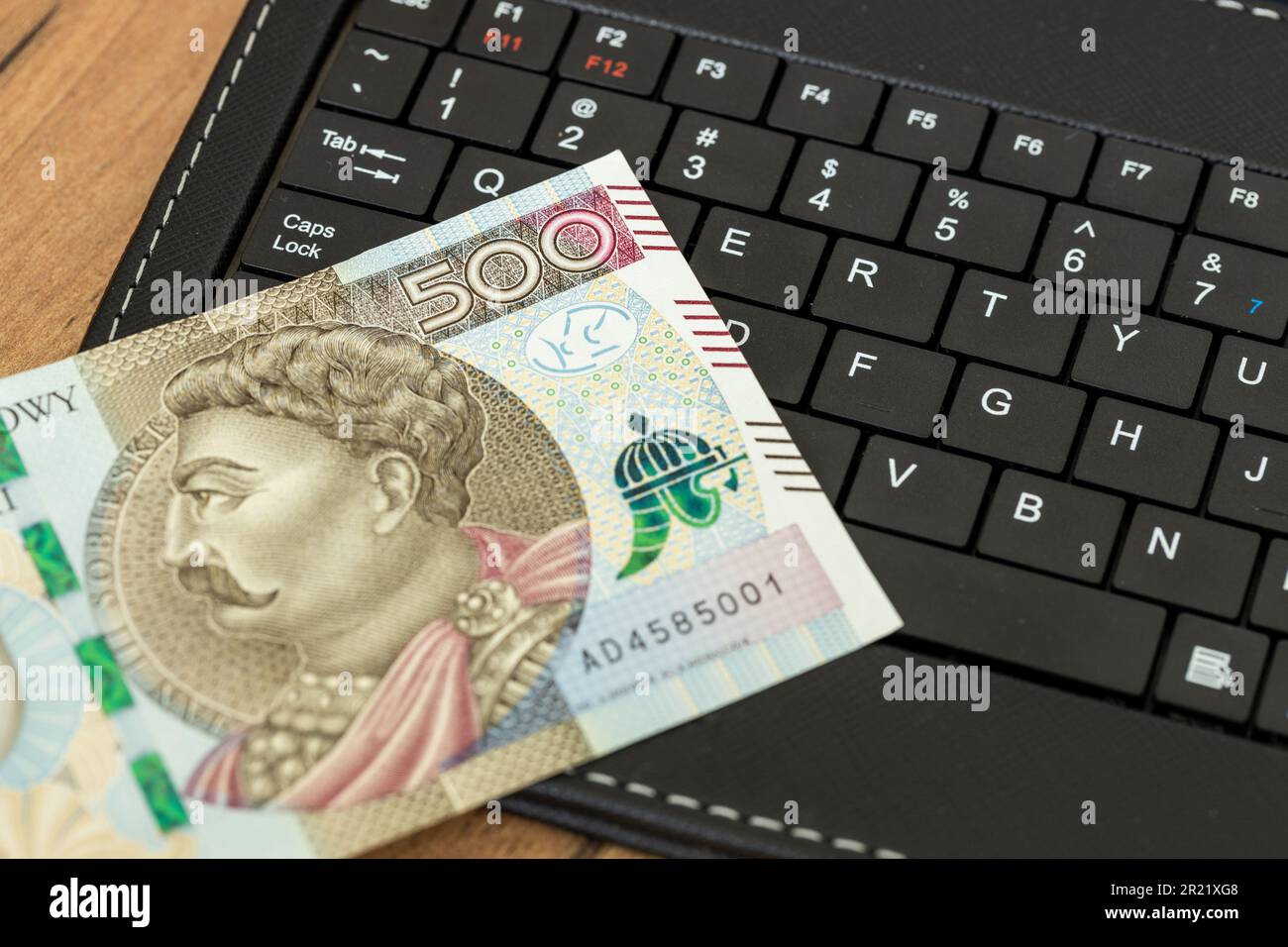 E-commerce business, Poland, money on tablet keyboard, 500 Polish zloty  banknote, Shopping and online stores, concept, online market, Payments and  ban Stock Photo - Alamy