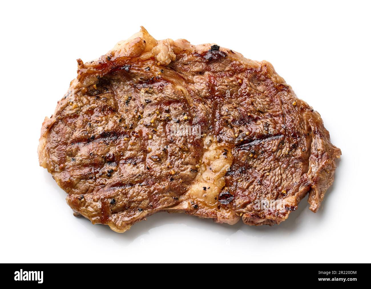 freshly grilled beef entrecote steak isolated on white background, top