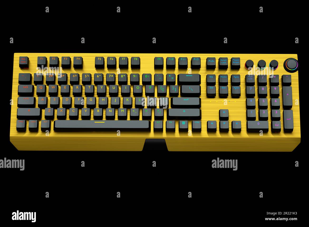 Yellow computer keyboard with rgb colors isolated on black background