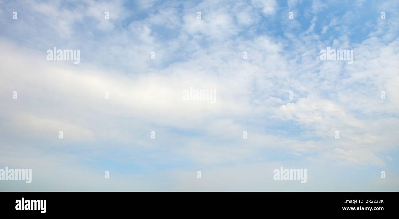 Blue sky and thick white clouds Stock Photo - Alamy