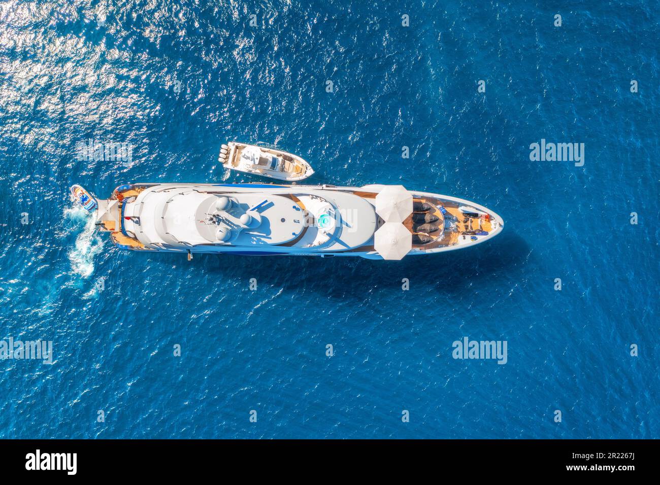 Aerial view of beautiful luxury yacht and boat in blue sea Stock Photo ...
