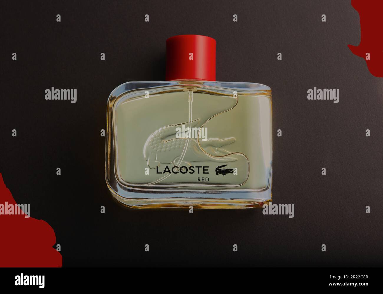 Bottle of Lacoste aftershave isolated on a black and red background Stock  Photo - Alamy
