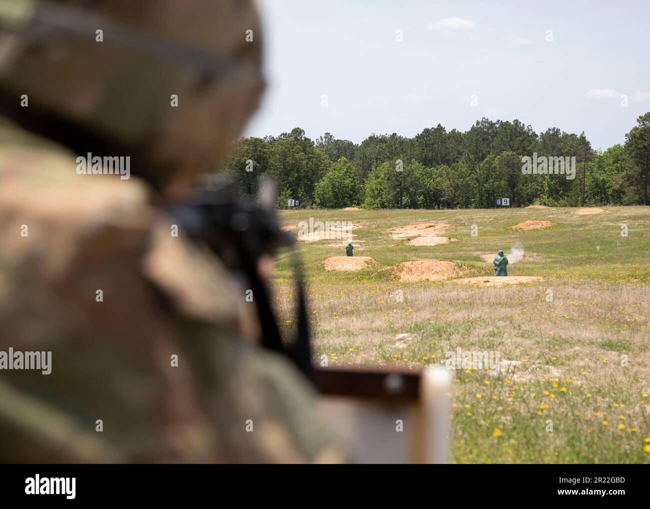 A U.S. Special Operations Soldier takes aim during an M4 qualification range while competing in the 8th Psychological Operations Group (Airborne) Best Squad Competition on May 9, 2023, on Fort Bragg, North Carolina. Soldiers were selected to challenge their physical endurance, tactical readiness, commitment to the Army Values, and unending resilience as they aspire to contend for the U.S. Army Best Squad Competition. (U.S. Army photo by Sgt. 1st Class Venessa Hernandez) Stock Photo