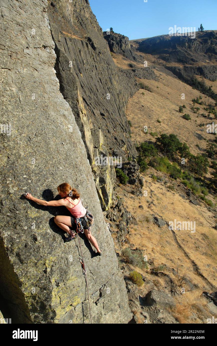 Woman rock climber in Tieton River canyon, Washington state Stock Photo