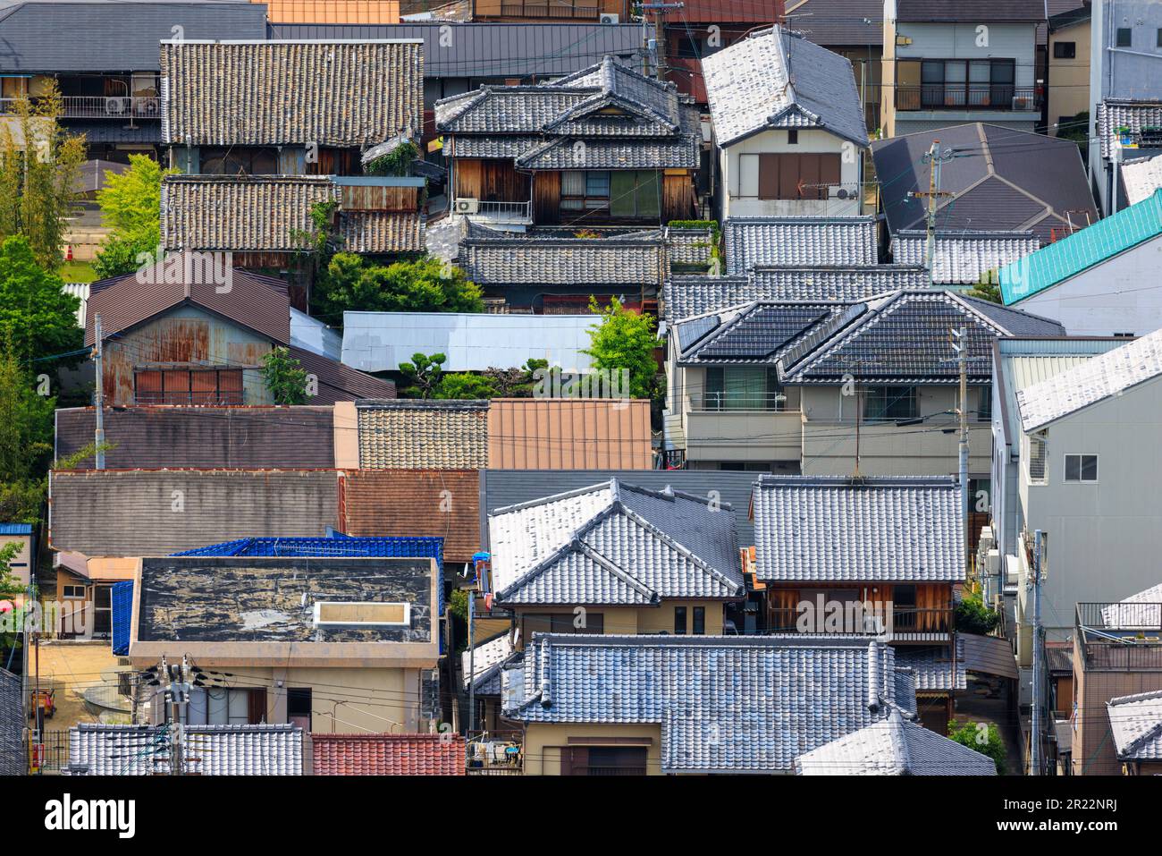 Looking down on roofs of old houses in small town Japan Stock Photo