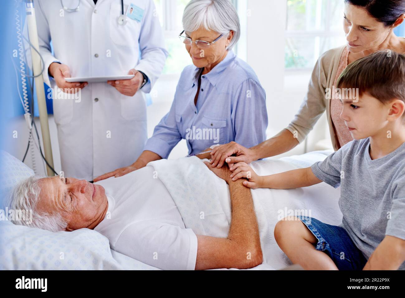 Old man in hospital bed with son hi-res stock photography and images ...