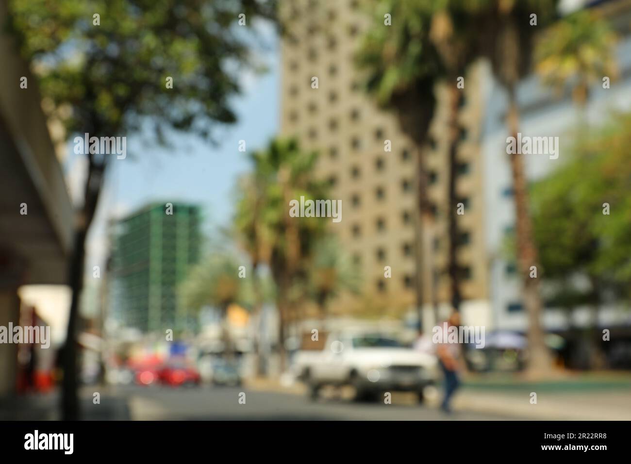Blurred view of city street with cars Stock Photo - Alamy