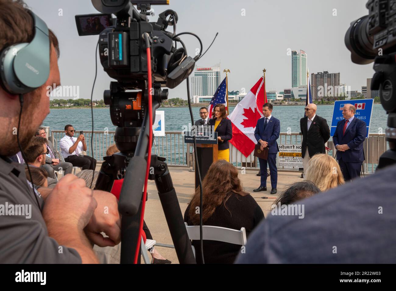 Detroit, Michigan, USA. 16th May, 2023. The United States and Canada announced plans for a binational electric vehicle corridor, with DC fast charging stations every 50 miles from Kalamazoo, Michigan to Quebec City, Quebec. Making the announcement at a dock on the Detroit River (with Canada across the river) were U.S. Transportation Secretary Pete Buttigieg and Canadian Minister of Transport Omar Alghabra, along with Michigan Governor Gretchen Whitmer, IBEW member William Baisden, and Detroit Mayor Mike Duggan. Credit: Jim West/Alamy Live News Stock Photo
