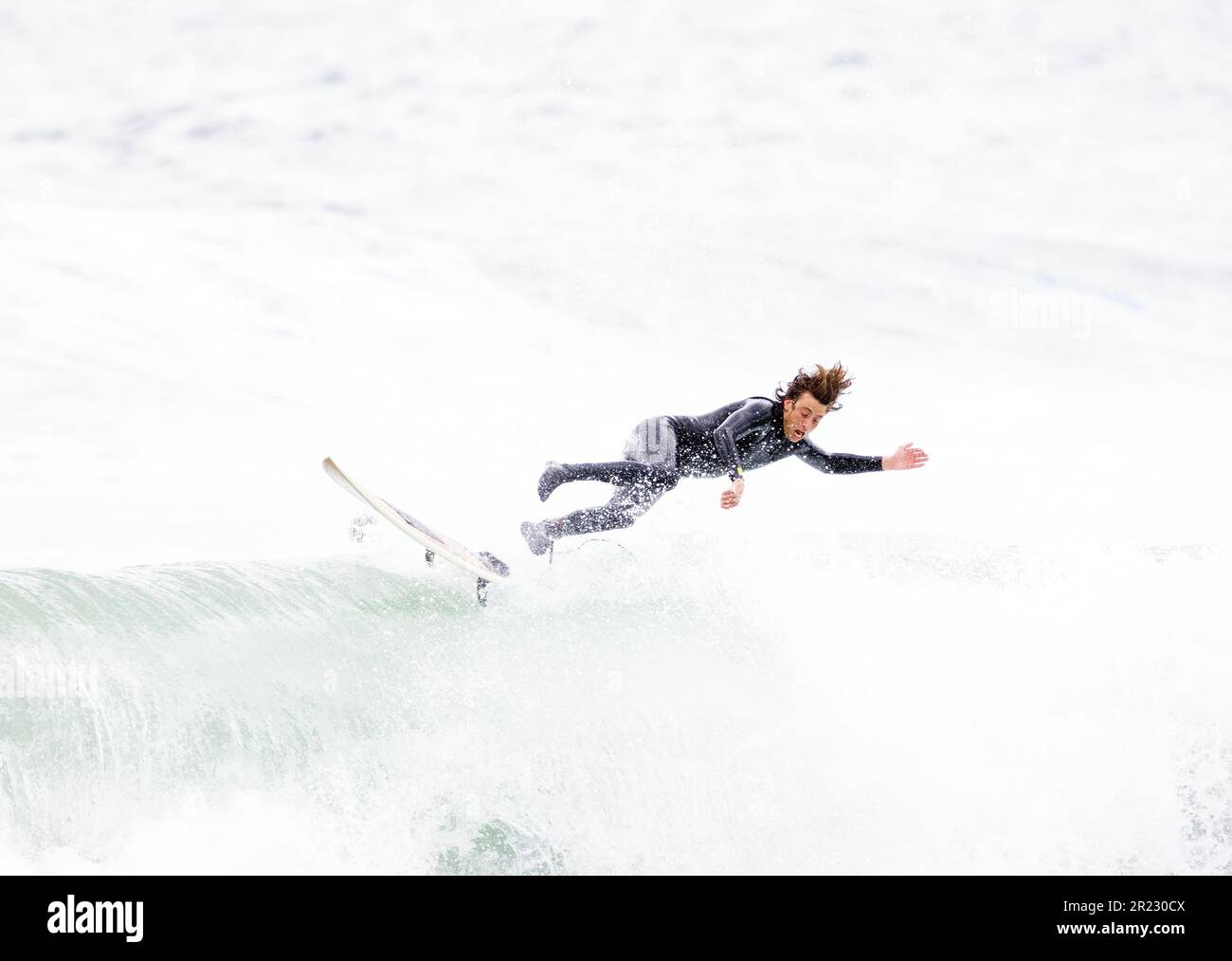 Surfer Wipe Out Stock Photo