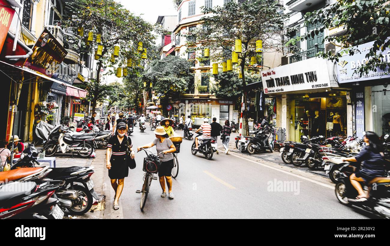 Hanoi, Vietnam, November 15, 2022: Busy steet scene in French Quarter of Hanoi. Stock Photo