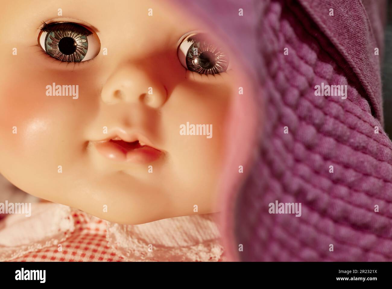 Close up of the Eye of a Vintage Doll with shallow depth of field Stock Photo