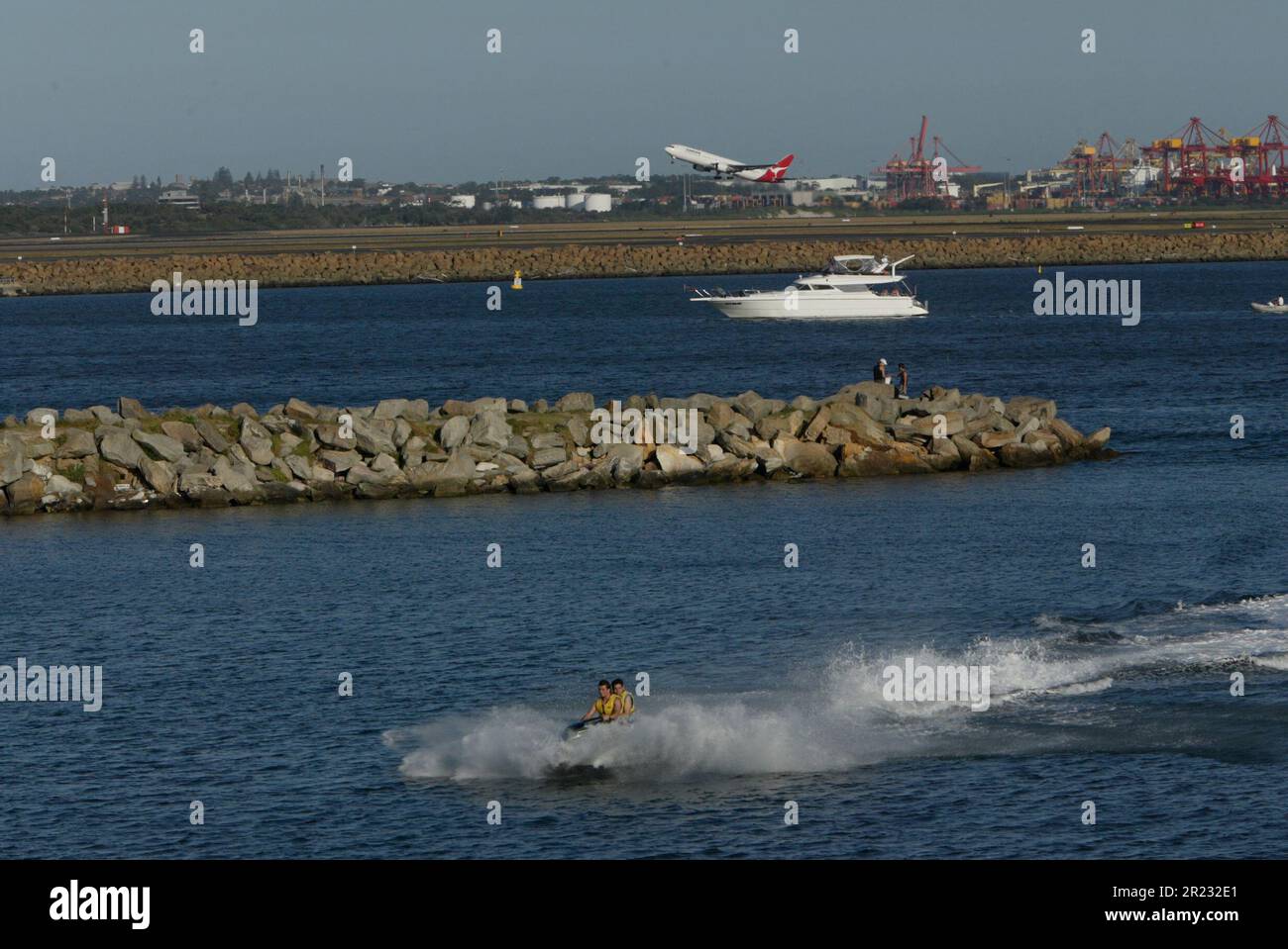 Aircraft and aircraft movements at Sydney (Kingsford Smith) Airport on Botany Bay in Sydney, Australia. Stock Photo