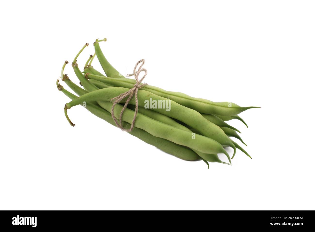 Bundle green beans bonded with jute rope isolated on white background Stock Photo