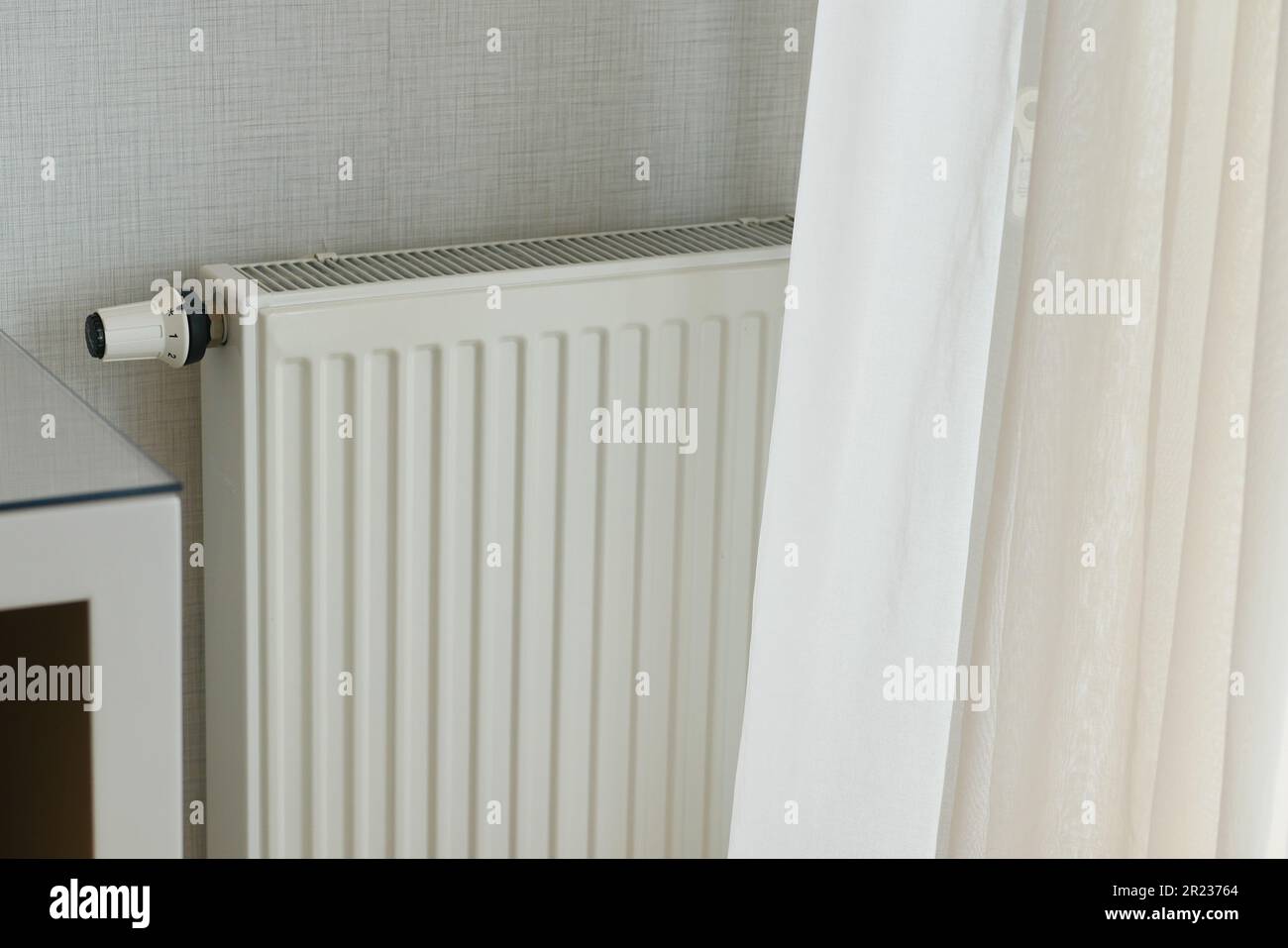 heating radiator under window in the room Stock Photo Alamy