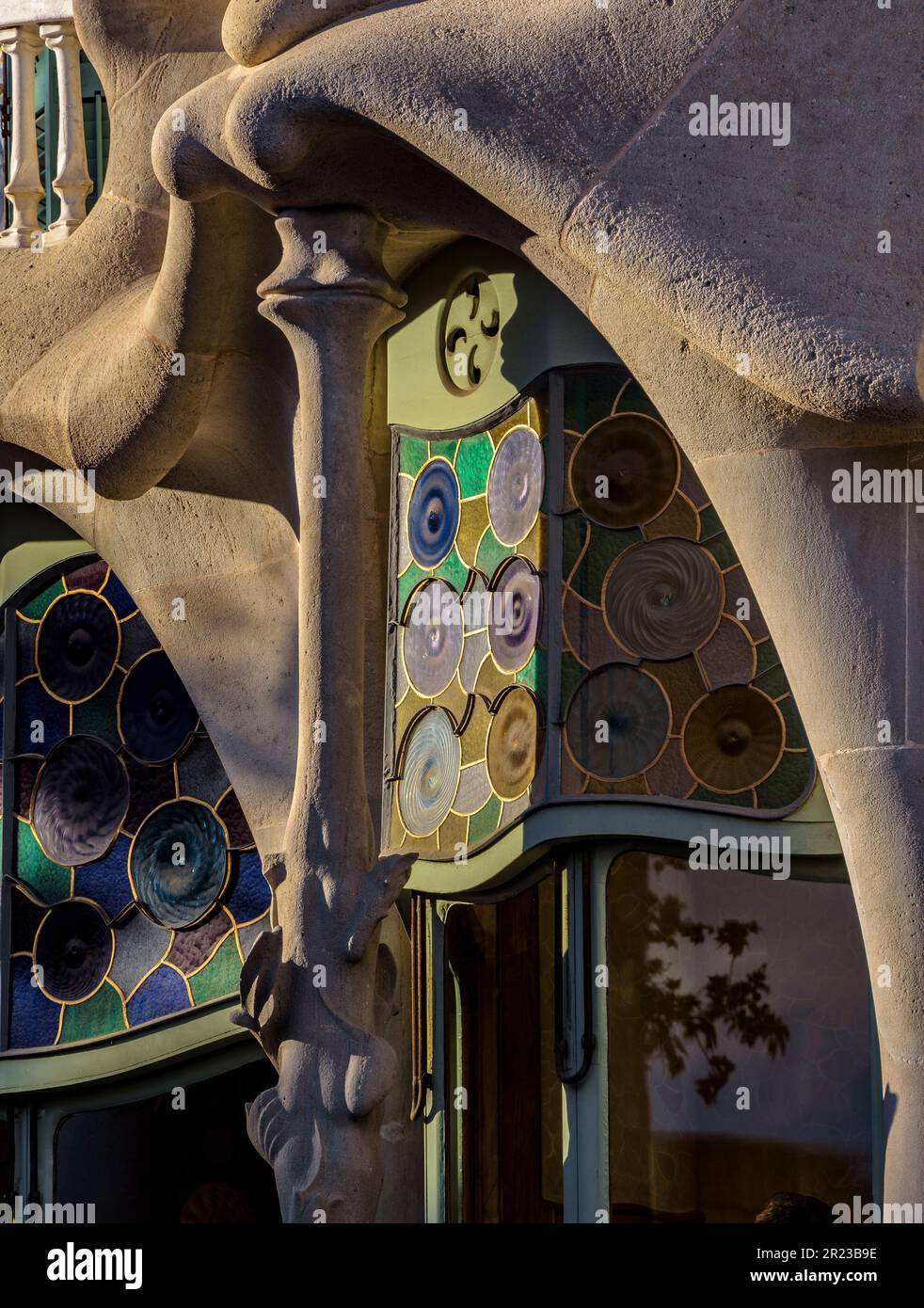 Detail of the large window of the noble floor of the Casa Batlló with columns of bone shapes and plant motifs (Barcelona, Catalonia, Spain) Stock Photo