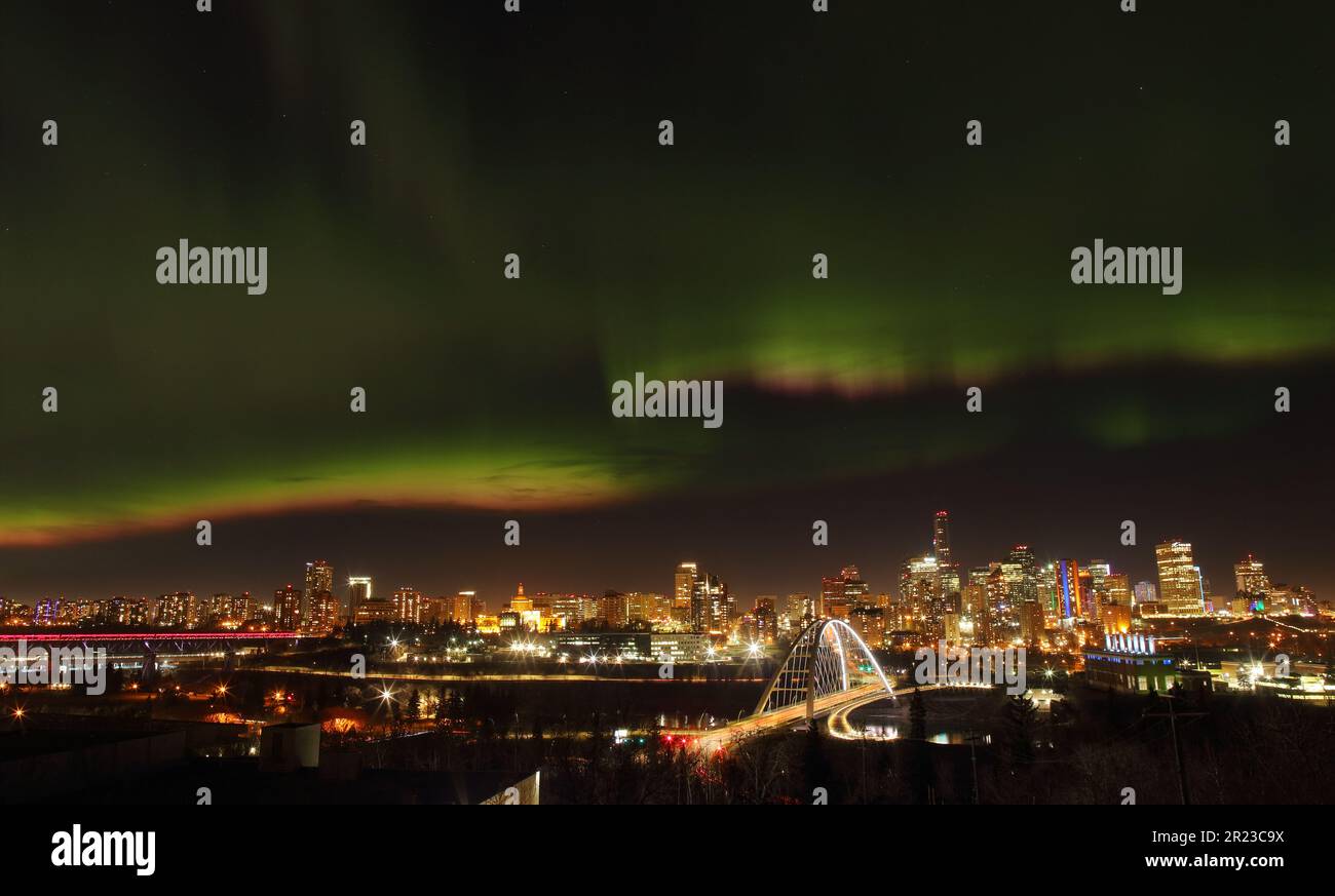 Northern Lights over cityscape in Edmonton, Alberta, Canada Stock Photo