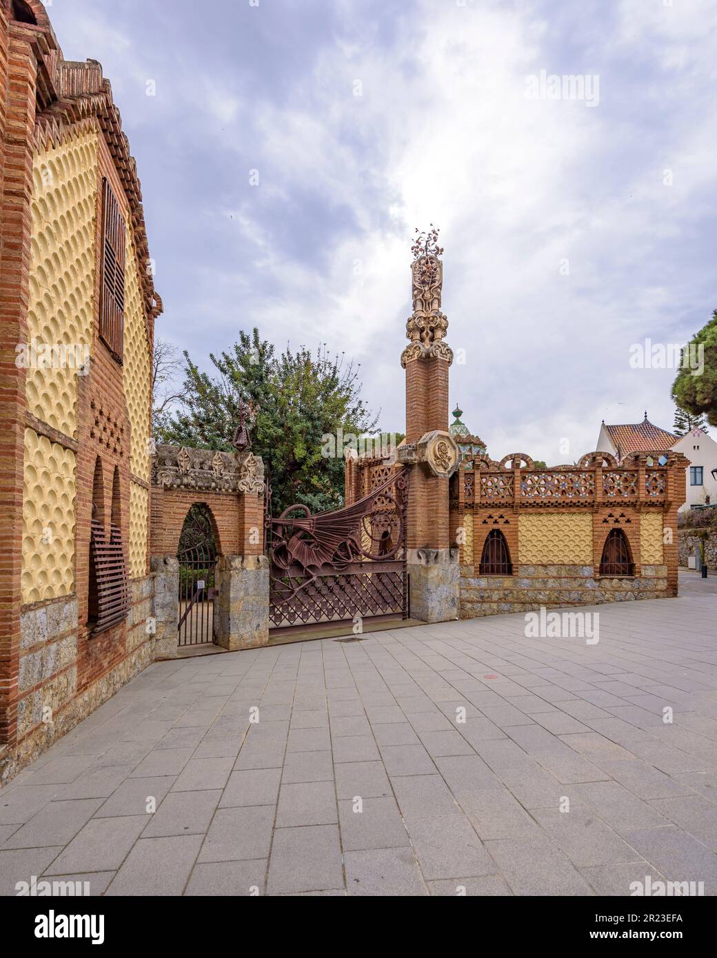 Wrought iron fence in the Güell Pavilions, a work by Gaudí, with the dragon that represents the guardian of the Garden of the Hesperides (Barcelona) Stock Photo