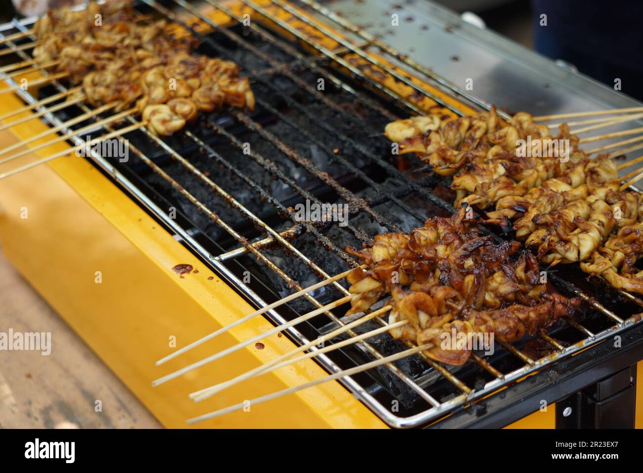 Satay Process Mushroom satay on grilled process. Sate is one of indonesian famous ...