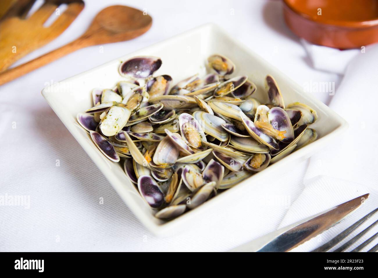 Spanish tapa of clams cooked in white wine. Traditional Spanish recipe