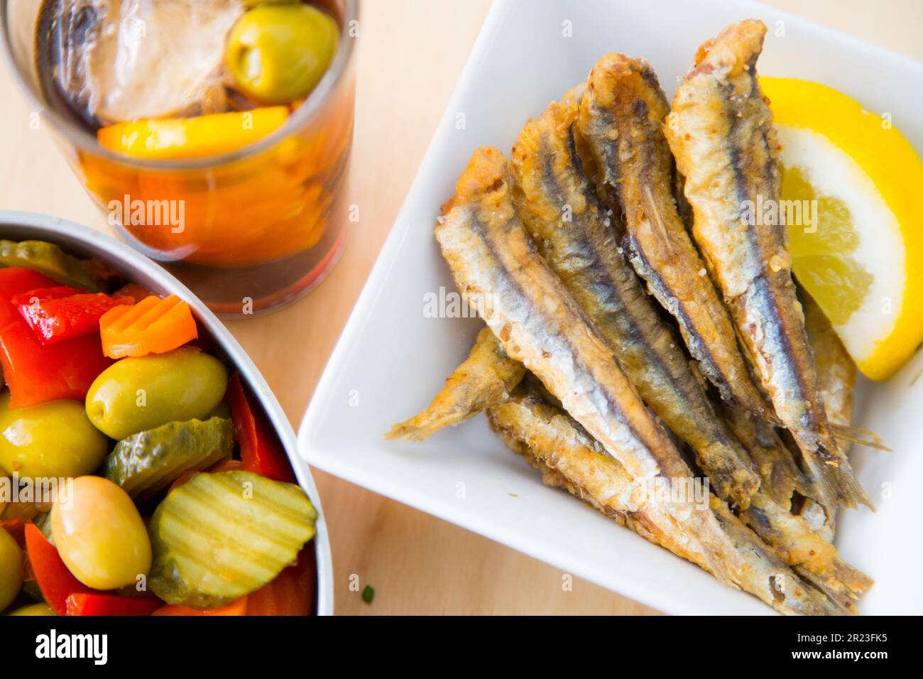 Battered anchovies. Traditional Spanish fish tapa. Stock Photo