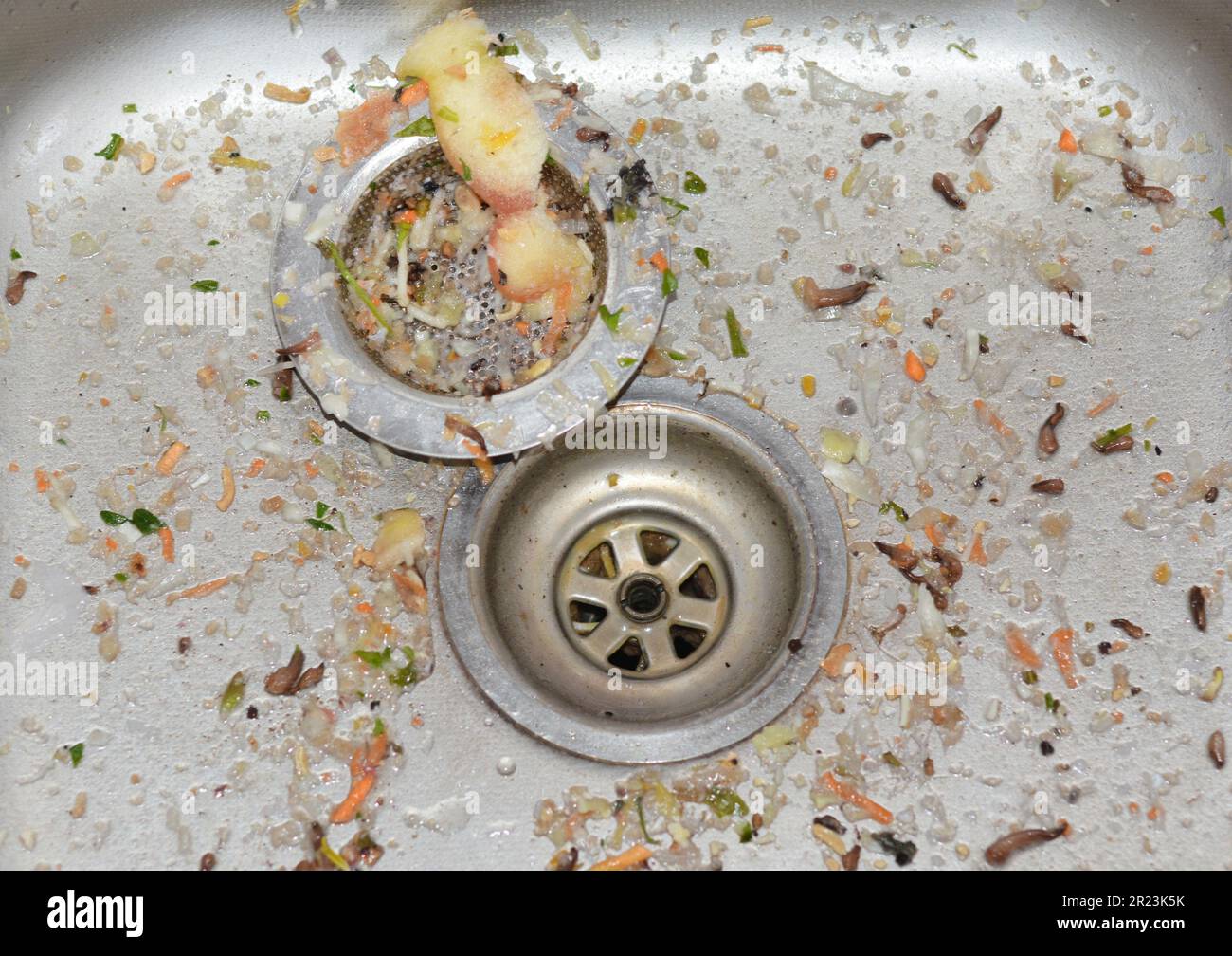 Close up on dirty and smelly stainless steel kitchen sink Stock Photo