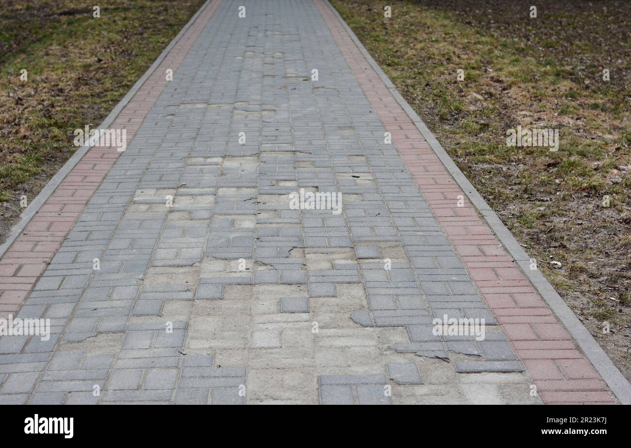 Broken pavements sidewalk. Damaged pavement need repair Stock Photo Alamy