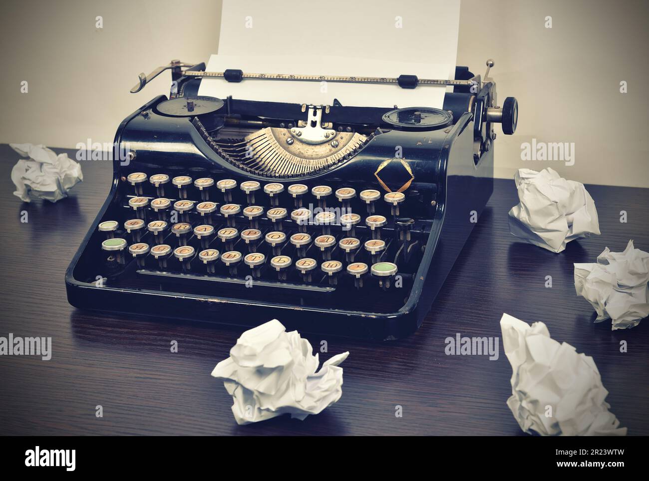Vintage typewriter with a blank piece of paper Stock Photo - Alamy